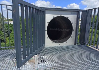 Evacuation slide, entry within the railing.