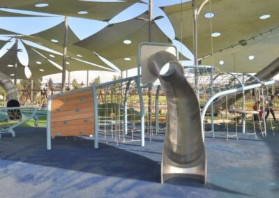 Metal tunnel slide for playgrounds